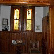 ont Foyer of the church showing the beautiful stained glass windows.